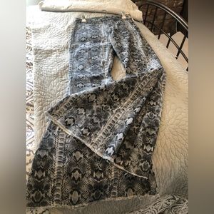 Free People.. “Float on Flares “ snake print NWT